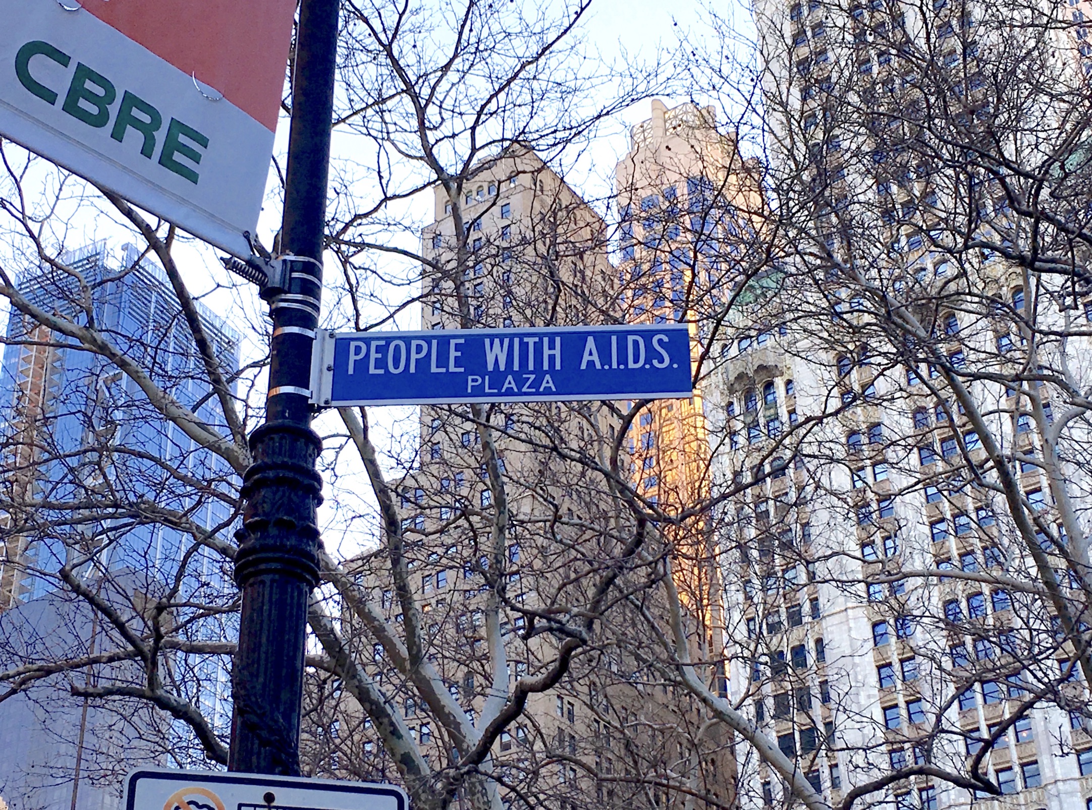 street sign - Cbre People With A.I.D.S. Plaza